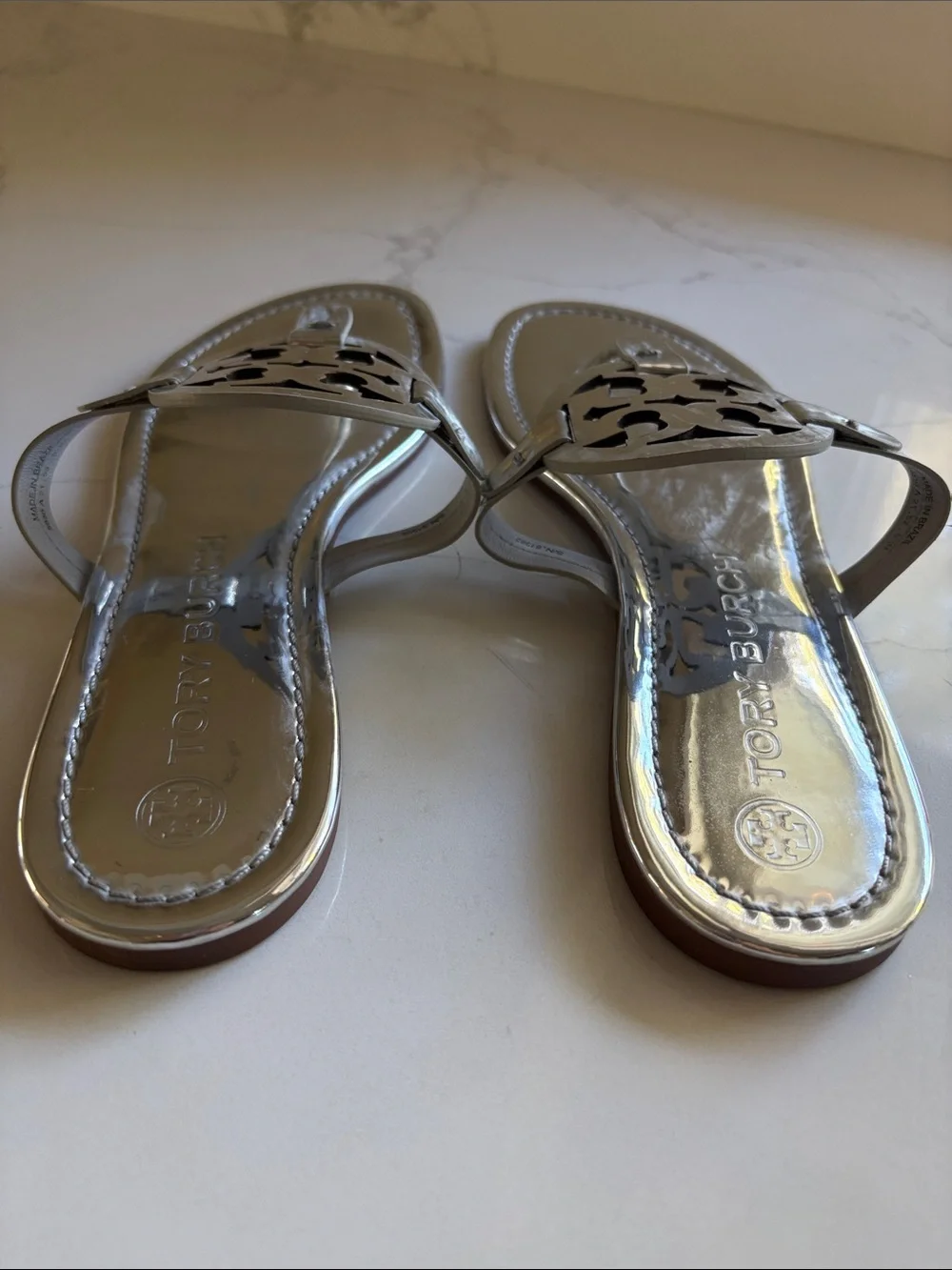 Tory Burch Women’s Metallic Silver Thong Sandals with Logo Medallion size 9.5